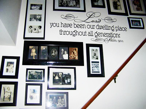 [Photo of a stairwell with wall stenciling of a Scripture verse]