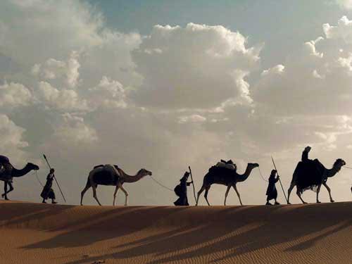 [Photo of wise men and camels on the horizon]