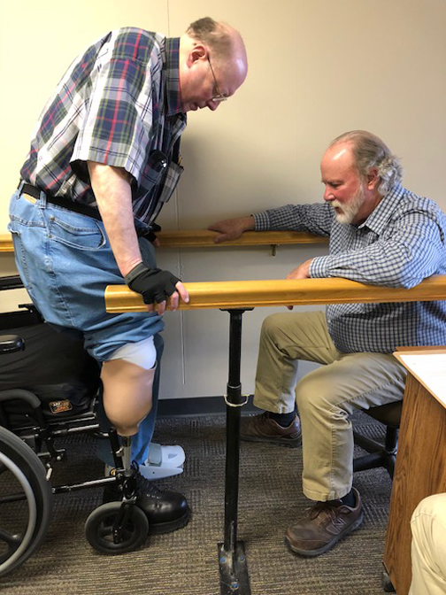[Photo of Dean at the second fitting of the temporary prosthesis]