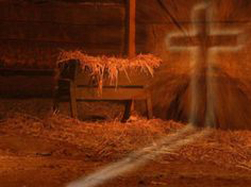Photo of a manger and a cross