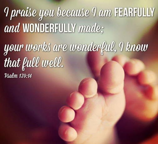 Photo of baby's feet with words superimposed