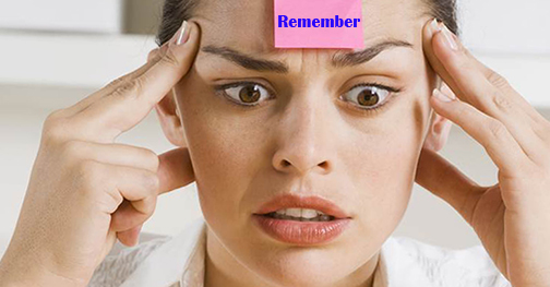 [Photo of woman with post-it on her forehead]